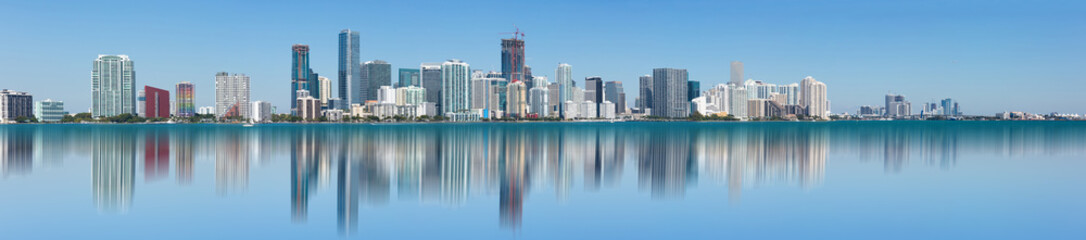Panoramic view of the Miami skyline from the bay. - obrazy, fototapety, plakaty