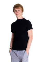 Fototapeta premium Young guy in shorts and a vest