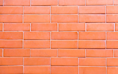 Smooth orange brick wall for texture
