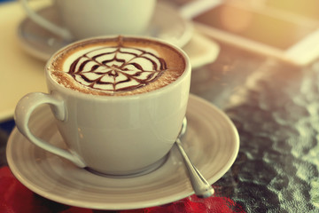 close up coffee cup in coffee shop  effect filter vintage style