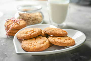 Delicious oatmeal cookies on plate, close up