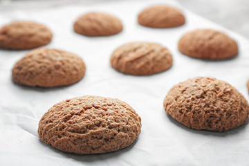 Delicious oatmeal cookies on table, close up