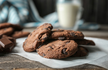 Delicious oatmeal cookies with chocolate chips on table, close up