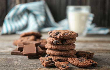 Delicious oatmeal cookies with chocolate chips on table, close up