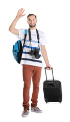 Attractive male tourist on white background