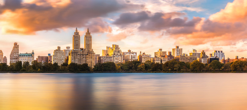 New York Upper West Side skyline at sunset as viewed from Central Park, across Jacqueline Kennedy Onassis Reservoir