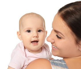 Happy young woman with cute baby on white background