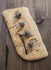 truffle chocolates on dark background