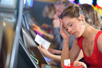 upset woman have lost in a casino