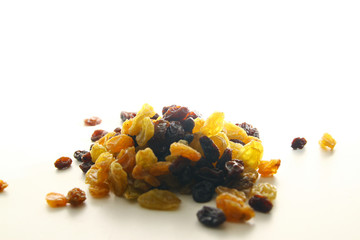 Raisins / A raisin is a dried grape. Raisins are produced in many regions of the world and may be eaten raw or used in cooking, baking, and brewing