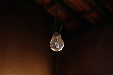 Lamp in dark and old house
