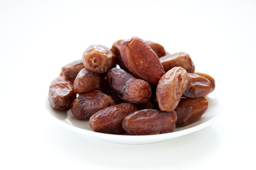 Dried Dates Fruits on dish white background