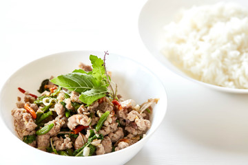 Topped with stir fried pork and basil