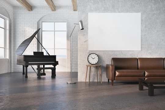 Black piano in a concrete room, poster, sofa