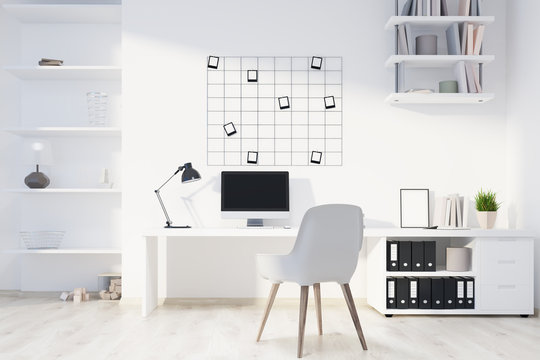 White home office interior, computer front