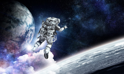 Fototapeta na wymiar Astronaut on space mission