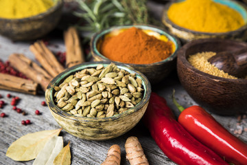 Wooden table of colorful spices