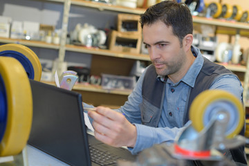 engineer checking pc