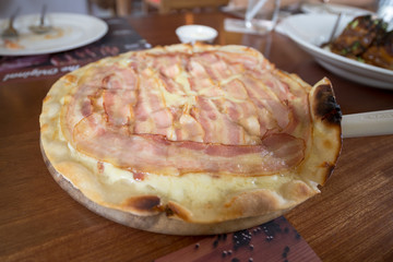 Bacon Pizza baked by stove, Italian food with Thai style