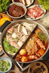  Double flavor hot pot on the table   