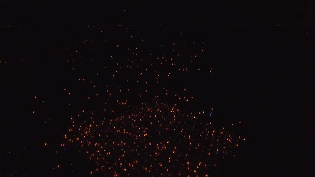 aerial light fest 100s of lanterns take to sky rotating close 4k amazing view