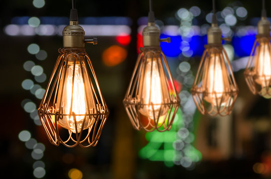 Row of vintage light bulb decor with bokeh background