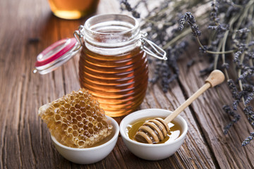 Fresh honey on wooden table