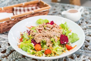 tuna with vegetables salad, sesame and spicy sauce