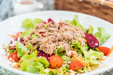 tuna with vegetables salad, sesame and spicy sauce