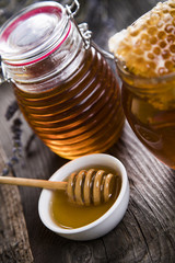 Fresh honey on wooden table