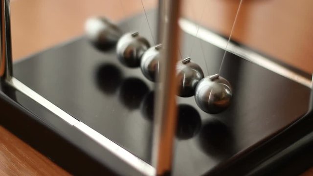 Newton's Cradle In Motion