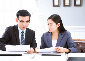 Businessman and woman is working together