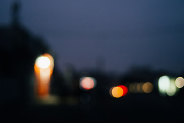 Bokeh urban blurring colours concept. Night life of a big city. Abstract background.