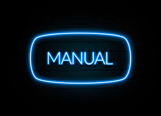 Manual  - colorful Neon Sign on brickwall