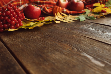 Autumn coziness ripe leaves mix wood surface concept. Colourful fall background.