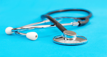 Stethoscope on a blue background.