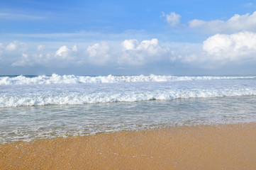 Fototapeta na wymiar sandy beach and blue sky