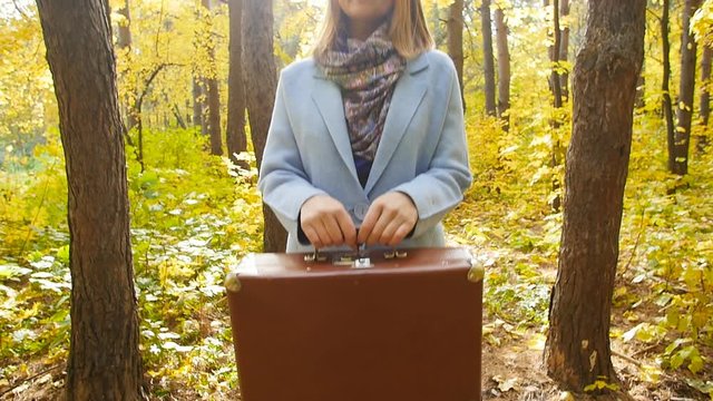 Beautiful fashion woman in autumn park