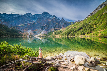 Beautiful sunrise at lake in the Tatra Mountains in autumn © shaiith
