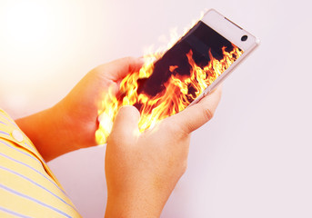 fire hand hold fire smartphone.