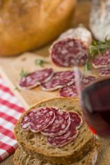 French salami Sausage on a wooden table