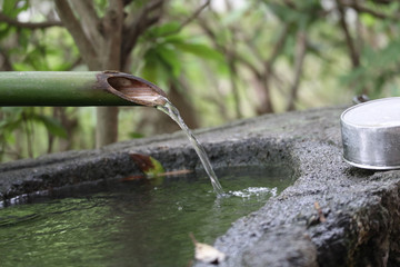 water-filled bamboo tube