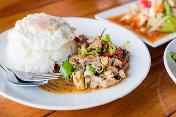 stir-fried pork and herb with rice or stir-fried Jango, Thai food