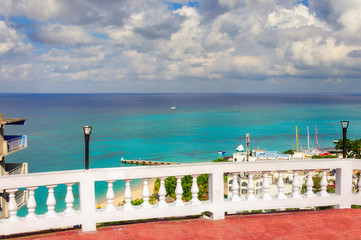 Naklejka premium Beautiful promenade alley over beach in Montego Bay, Jamaica. Caribbean paradise island.