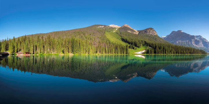 Panorama of Rocky Mountains - Emerald lake in Yoho National Park, Canadian Rocky Mountains, Canada.