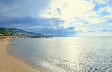 Fototapeta na wymiar Beach of Black Sea from Albena, Bulgaria with golden sands, blue clear water, sunrise