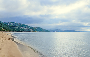 The Black Sea shore from Albena, Bulgaria with golden sands, sun, blue mystic water, green coastline