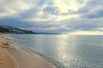 The Black Sea shore from Albena, Bulgaria with golden sands, sun, blue mystic water, green coastline