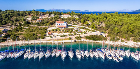 Fototapeta na wymiar Yachts ancored in bay at Fiskardo Kefalonia Greece