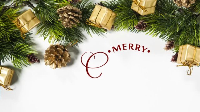 Hand Writing white Merry Christmas animation calligraphy lettering text on white background with gifts and holidays branches decoration. For video Greeting card. Happy feeling